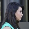 Kim Kardashian, enceinte et superbement moulée dans une robe verte, quitte le maison d'enchères Heritage Auctions. Beverly Hills, le 17 avril 2013.