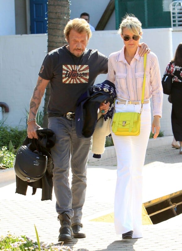 Johnny Hallyday et sa femme Laeticia à Malibu, le 27 avril 2013.