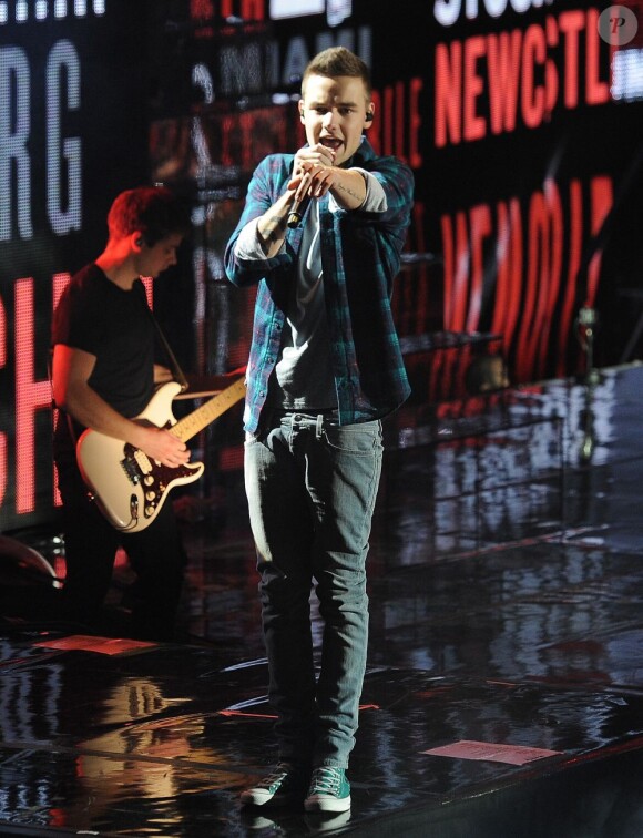 Le jeune Liam Payne et son groupe One Direction en concert à Londres, le 23 février 2013.