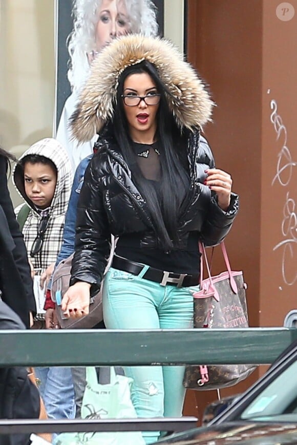NO WEB NO APPS - EXCLUSIVE - French model and reality star Nabilla Benattia is spotted going to Raphael Kian hair salon in Paris, France on April 13, 2013. Nabilla carries her glasses, a green pant and black jacket. Photo by ABACAPRESS.COM14/04/2013 - Paris
