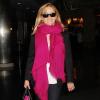 Reese Witherspoon, redevenue blonde, et son mari Jim Toth arrivent à l'aéroport de New York, le 13 mai 2013.