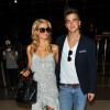 Paris Hilton et son compagnon River Viiperi à l'aéroport de Los Angeles le 14 mai 2013 en partance pour le Festival de Cannes
