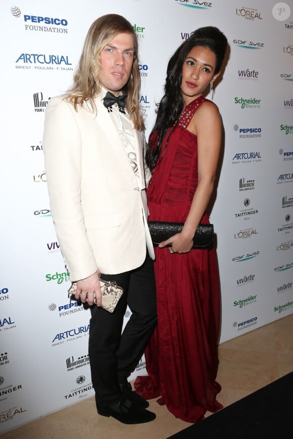 Le créateur Christophe Guillarmé et l'actrice Joséphine Jobert à la soirée Planet Finance dans le grand salon du Carlton à l'occasion du 66eme festival de Cannes le 16 mai 2013.