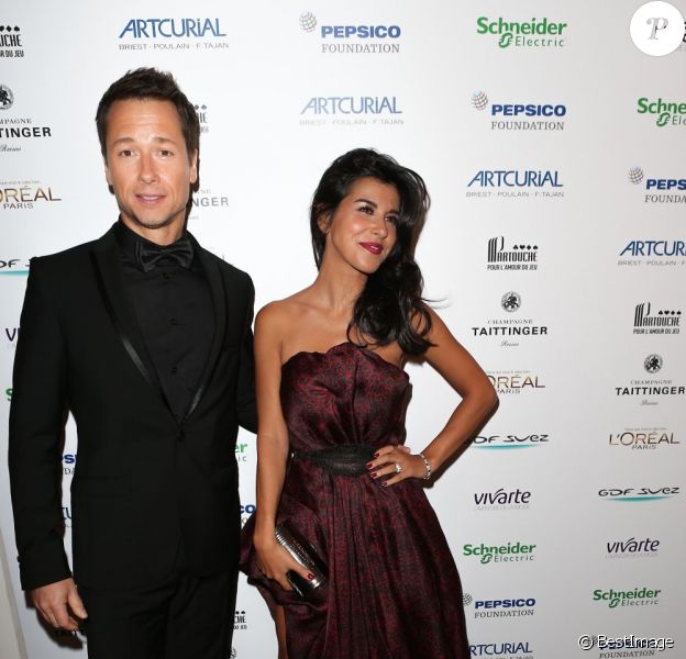 Stéphane Rousseau et sa compagne Reem Kherici à la soirée Planet Finance dans le grand salon du Carlton à l'occasion du 66eme festival de Cannes le 16 mai 2013.