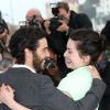 Tahar Rahim et Rebecca Zlotowski au photocall du film Grand Central à l'occasion du 66e festival du film de Cannes le 18 mai 2013.