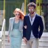 Jessica Chastain et son petit ami Gian Luca Passi sortent de l'Hôtel Cap-Eden-Roc à Antibes lors du 66e Festival du film de Cannes, le 19 mai 2013.