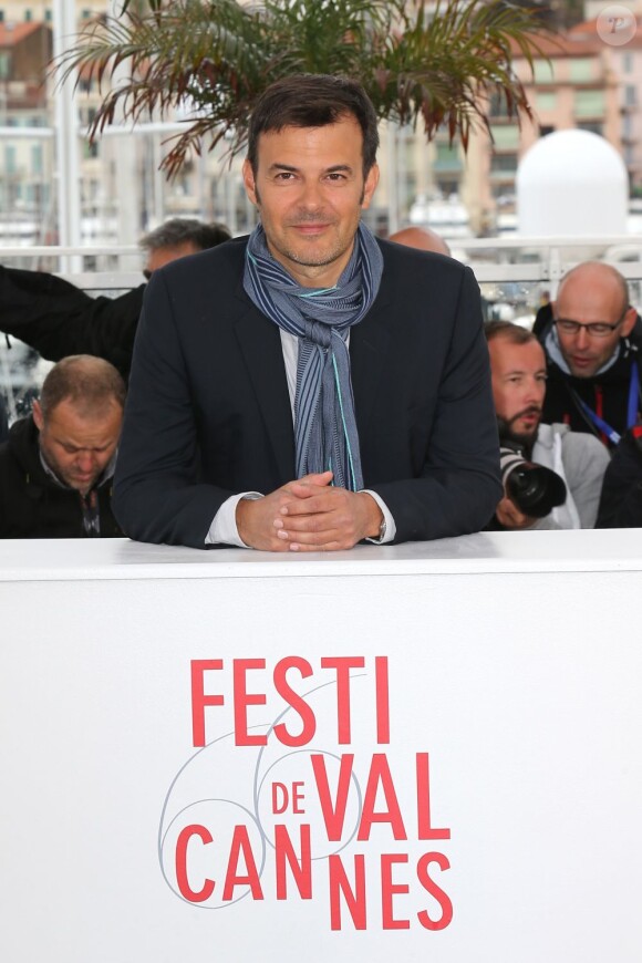 Francois Ozon lors du photocall du film Jeune et Jolie au Festival de Cannes le 16 mai 2013