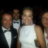 Sharon Stone entourée de l'artiste Richard Orlinski et de Bernard Montiel au 20e Gala de l'amfAR à l'hôtel du Cap-Eden-Roc lors du 66e Festival de Cannes, le 23 Mai 2013.