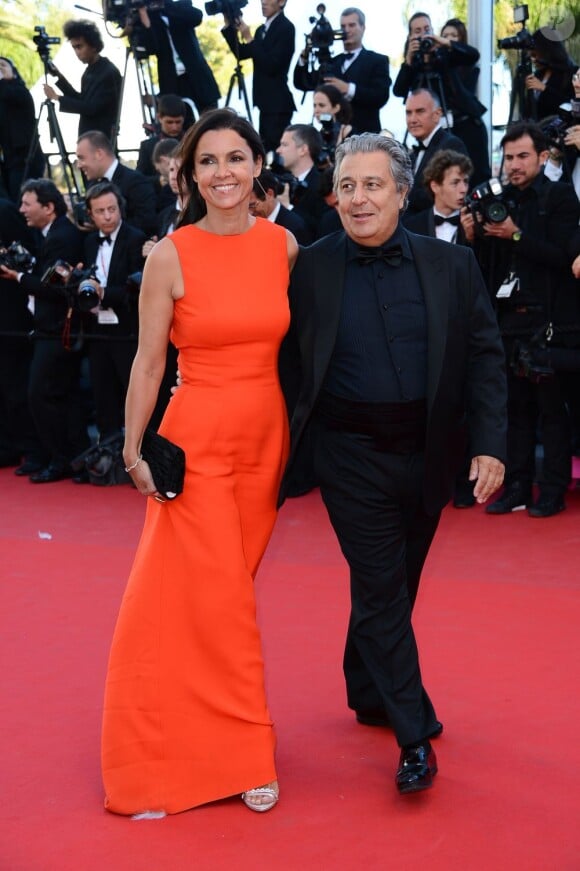 Christian Clavier et sa femme posent à la montée des marches du film The Immigrant au Palais des Festivals à Cannes, le 24 mai 2013.