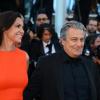 Christian Clavier et sa femme pendant la montée des marches du film The Immigrant au Palais des Festivals à Cannes, le 24 mai 2013.
