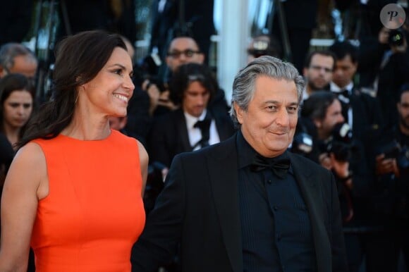 Christian Clavier et sa femme pendant la montée des marches du film The Immigrant au Palais des Festivals à Cannes, le 24 mai 2013.
