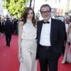 Christophe Barratier et sa compagne Gwendoline Doycheva en robe YDE et pochette Swarovski - Montee des marches du film "The Immigrant" lors du 66eme festival du film de Cannes. Le 24 mai 2013