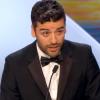 Oscar Isaac récupère au nom des frères Coen le Grand prix du jury à Inside Llewyn Davis lors de la cérémonie de clôture et la remise des prix du Festival de Cannes le 26 mai 2013