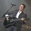 Patrick Bruel heureux et ému pendant son concert au Zénith de Paris le 30 mai 2013.