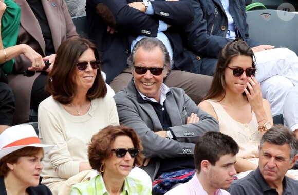 Michel Leeb entre sa femme Béatrice et sa fille Fanny lors du 8e jour des Internationaux de France à Roland-Garros le 2 juin 2013