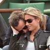 Anne-Sophie Lapix et son mari Arthur Sadoun lors du 8e jour des Internationaux de France à Roland-Garros le 2 juin 2013