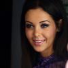 Nabilla Benattia, ravissante et souriante, à la sortie de NRJ 12 à Paris le 5 juin 2013