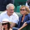 Dominique Strauss Kahn et sa compagne Myriam L'Aouffir à Roland-Garros le 8 juin 2013 lors des Internationaux de France