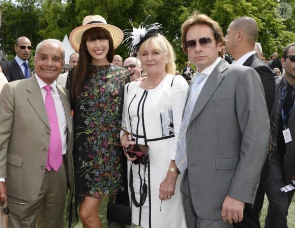 Yves Saint-Martin avec sa femme son fils et Nolwenn Leroy au prix de Diane Longines à l'hippodrome de Chantilly, le 16 juin 2013