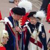 Cérémonies annuelles de l'Ordre de la Jarretière, lundi 17 juin 2013 à Windsor. Après un déjeuner au château, la reine Elizabeth II a mené avec son fils le prince Charles et son petit-fils le prince William, en l'absence du duc d'Edimbourg, la procession jusqu'à la chapelle Saint George.