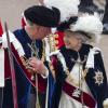 Cérémonies annuelles de l'Ordre de la Jarretière, lundi 17 juin 2013 à Windsor. Après un déjeuner au château, la reine Elizabeth II a mené avec son fils le prince Charles et son petit-fils le prince William, en l'absence du duc d'Edimbourg, la procession jusqu'à la chapelle Saint George.