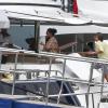 Tamara Ecclestone et Jay Rutland montent a bord du Diamonds are for ever, un luxueux yach amaré dans le port de Capri, le 24 juin 2013