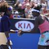 Venus et Serena Williams lors de l'Open d'Australie au Melbourne Park de Melbourne le 20 janvier 2013