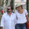 Inès de la Fressange et son compagnon Denis Olivennes dans les rues de Saint-Tropez, le 29 juin 2013.