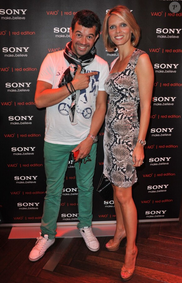 Stéphane Plaza et Sylvie Tellier à la soirée Sony Style à la boutique Sony (39 avenue George V), à Paris le 2 juillet 2013.