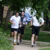 L'ancien président Nicolas Sarkozy, en plein jogging avec ses gardes du corps au Bois de Boulogne. Paris, le 5 juillet 2013.