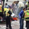 Scène dramatique au marathon de Boston, Massachusetts, où ont lieu deux attentats à la bombe consécutifs le 15 avril 2013.