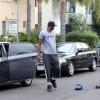 Lamar Odom, le mari de Khloe Kardashian, s'en prend à un paparazzi et à sa voiture. Mercredi 10 juillet.
