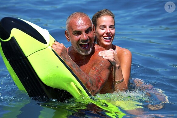 Exclusif - Christian Audigier en vacances avec sa sublime fiancée Nathalie Sorensen à Ibiza le 7 juillet 2013.