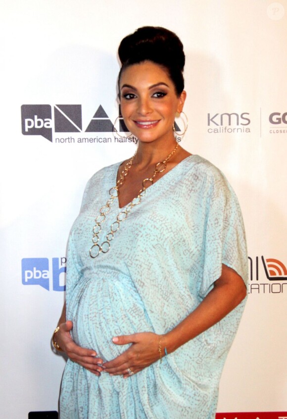 Courtney Mazza enceinte aux "North America Hairstyling Award" au casino Mandalay Bay à Las Vegas. Le 14 juillet 2013.