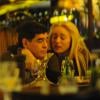 Diego Maradona lors d'un dîner romantique avec sa très jeune compagne Rocio Oliva dans un restaurant de Buenos Aires le 16 juillet 2013