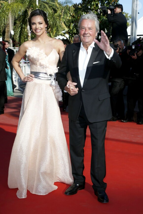 Alain Delon, Marine Lorphelin (robe Eric Tibusch) - Montee des marches du film "Zulu" lors de la cloture du 66eme festival du film de Cannes le 26 mai 201326/05/2013 - Cannes
