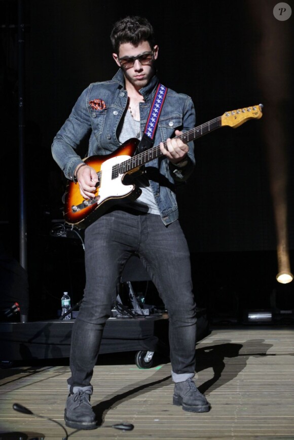 Nick Jonas en concert avec les Jonas Brothers à New York le 20 juillet 2013.