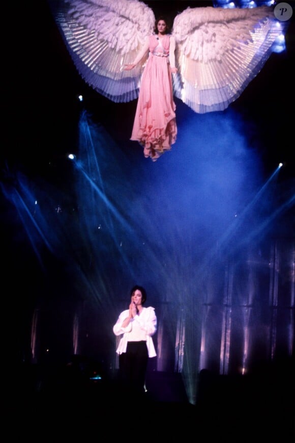 Michael Jackson performing on stage as an angel is lowered from above during the 'Dangerous Tour' at Tokyo Dome in Tokyo, Japan on December 24, 1992. Photo by PA Photos/ABACAPRESS.COM24/12/1992 - Tokyo