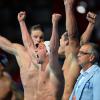 Yannick Agnel, Florent Manaudou, Fabien Gilot and Jérémy Stravius exultent de joie après être devenus champion du monde du relais 4x100m nage libre lors des mondiaux de Barcelone le 28 juillet 2013 au Palau Sant Jordi
