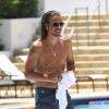 Exclusif - Le chanteur de Soundgarden Chris Cornell et sa femme Vicky Karayiannis en vacances à Miami le 31 juillet 2013.