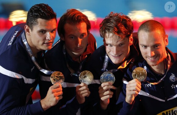 Florent Manaudou, Fabien Gilot, Yannick Agnel et Jérémy Straviusle 28 juillet 2013, champion du monde du relais 4x100 mètres nage libre à Barcelone au Palau San Jordi