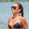 La splendide Sylvie Van der Vaart profite de son célibat en vacances avec une amie sur la plage de Pampelonne au Club 55, Saint-Tropez le 3 aout 2013.