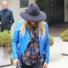 La chanteuse Fergie enceinte et son mari Josh Duhamel à l'église à Brentwood, le 4 août 2013.