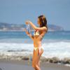 Natalia Proza en pleine séance photo pour la marque 138 Water à Zuma Beach. Malibu, le 6 aout 2013.