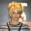 Pamela Anderson fait la promotion de la gamme de produits "Obliphica" à Las Vegas, le 14 juillet 2013.