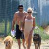 Pamela Anderson promène ses chiens en compagnie de son ex-mari Rick Salomon à Los Angeles, le 5 juillet 2013.