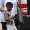 Raymond V, le fils d'Usher, à la sortie d'un hôtel de Manhattan, août 2013.