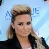 Demi Lovato à la cérémonie des Teen Choice Awards 2013 au Gibson Amphitheatre à Universal City. Le 11 août 2013.