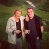 Eddy Mitchell et Johnny Hallyday pendant le tournage du film "Salaud, on t'aime" à Saint-Gervais-les-Bains, juillet 2013.