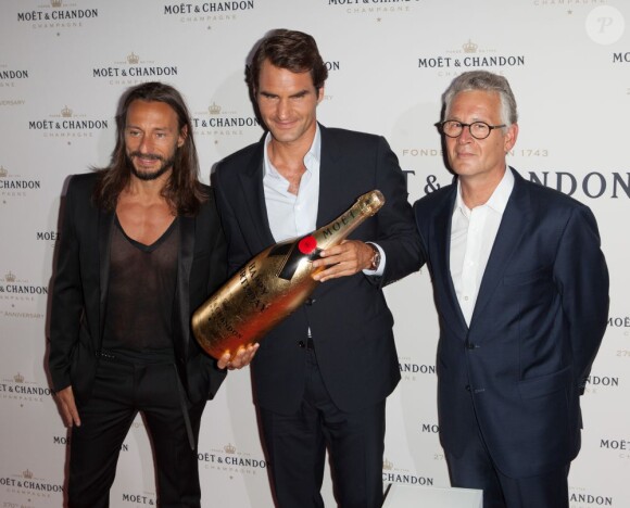Bob Sinclar, Roger Federer et le président de la maison de Champagne Stéphane Baschiera lors des 270 ans de Moët & Chandon à New York le 20 août 2013.